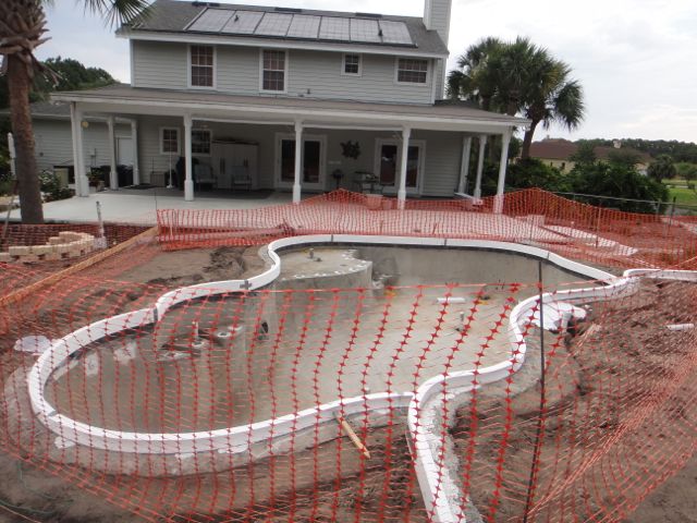 They pour the deck tomorrow, May 11 great looking pool decks