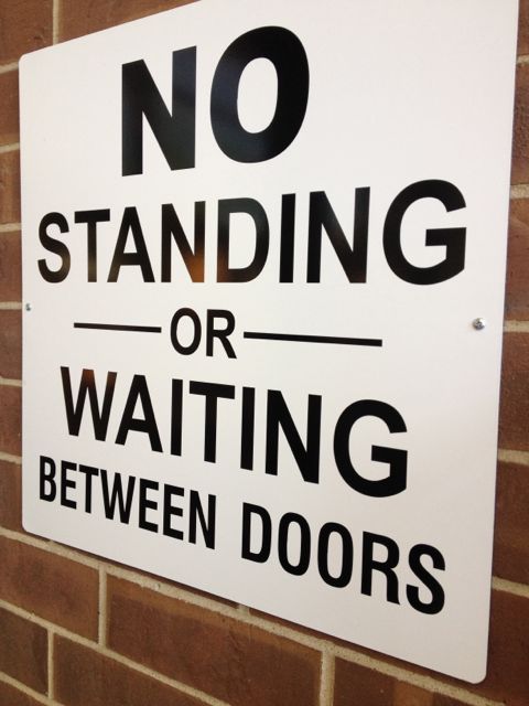 the sign is there to clarify who's attitude shall prevail (the establishment wins...again) opposing attitudes