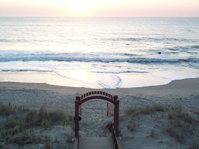 photo of ceremonial arch at beach