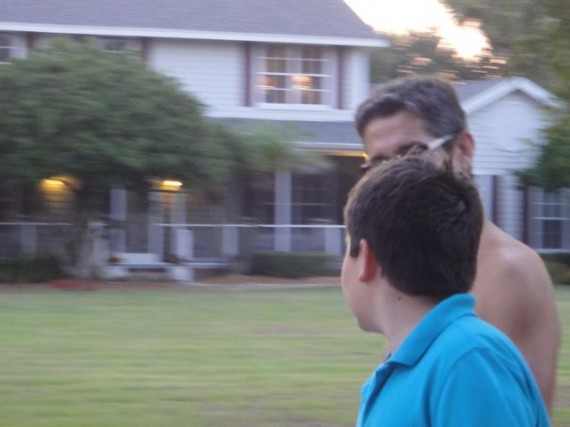 Father and Son talking during neighborhood walk