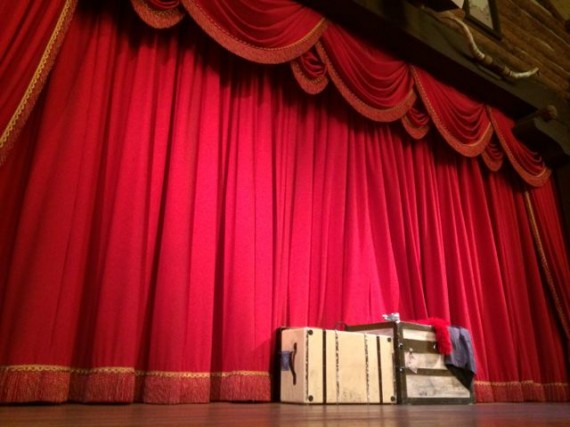 Stage with big red curtain at Hoop dee foo review
