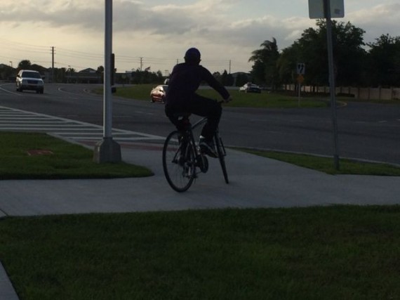 Boy on bike at dusk near Walt Disney World