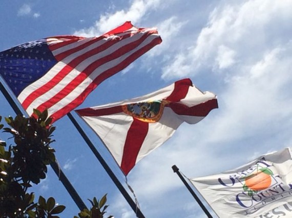 Three important flags blowing in the strong wind