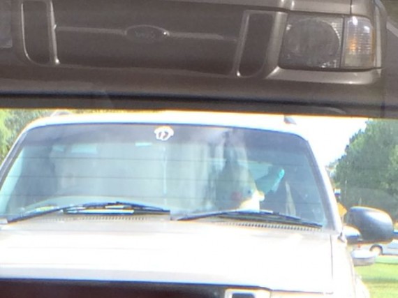 Life size Simpson's character in car