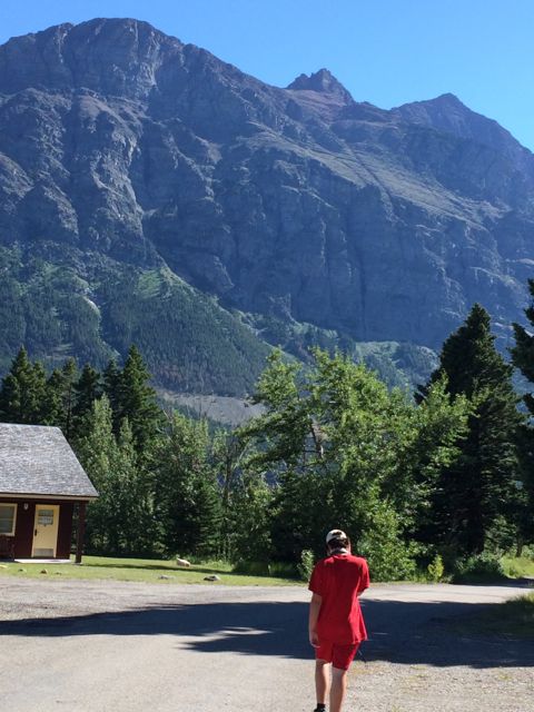 Teen walking to Two Dog Flats at Rising Sun Motor Inn