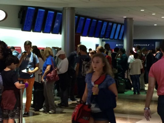 Harried woman rushing through Atlanta airport