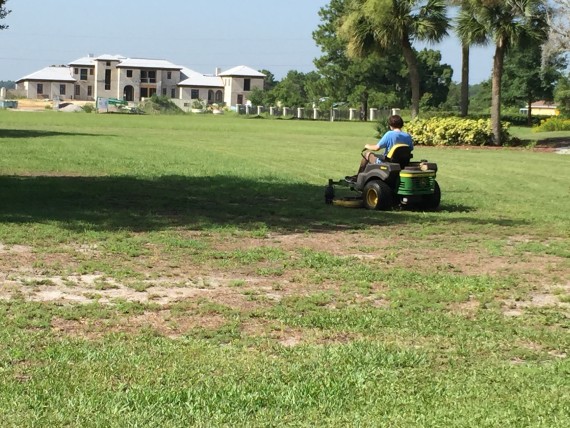 Riding lawn mower near Disney